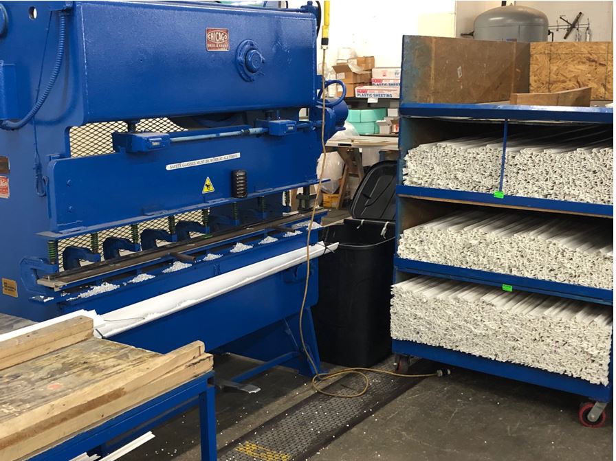 Blue punching machine and finished plastic profiles