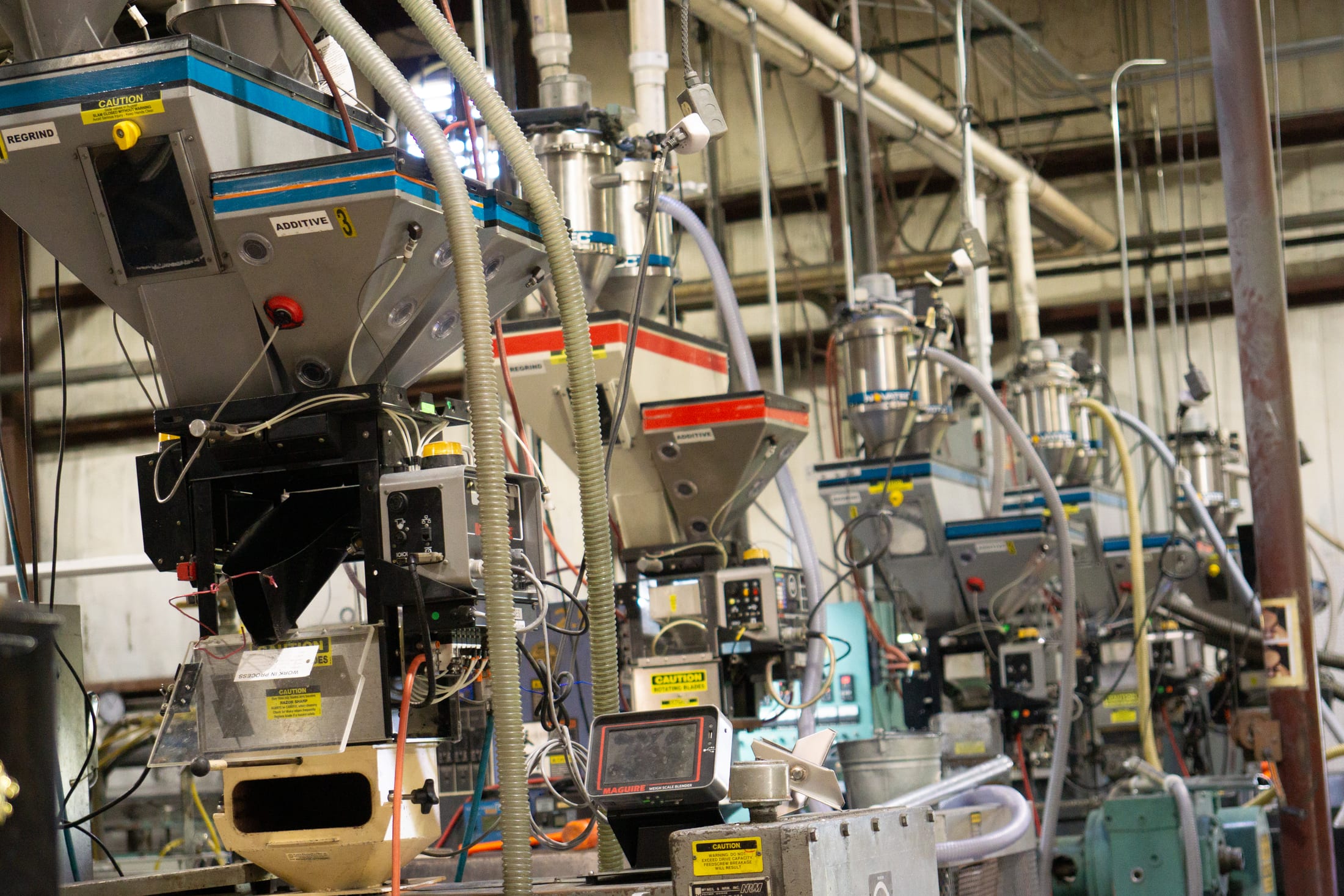Hoppers and line equipment at the MAC Plastics Hamilton facility